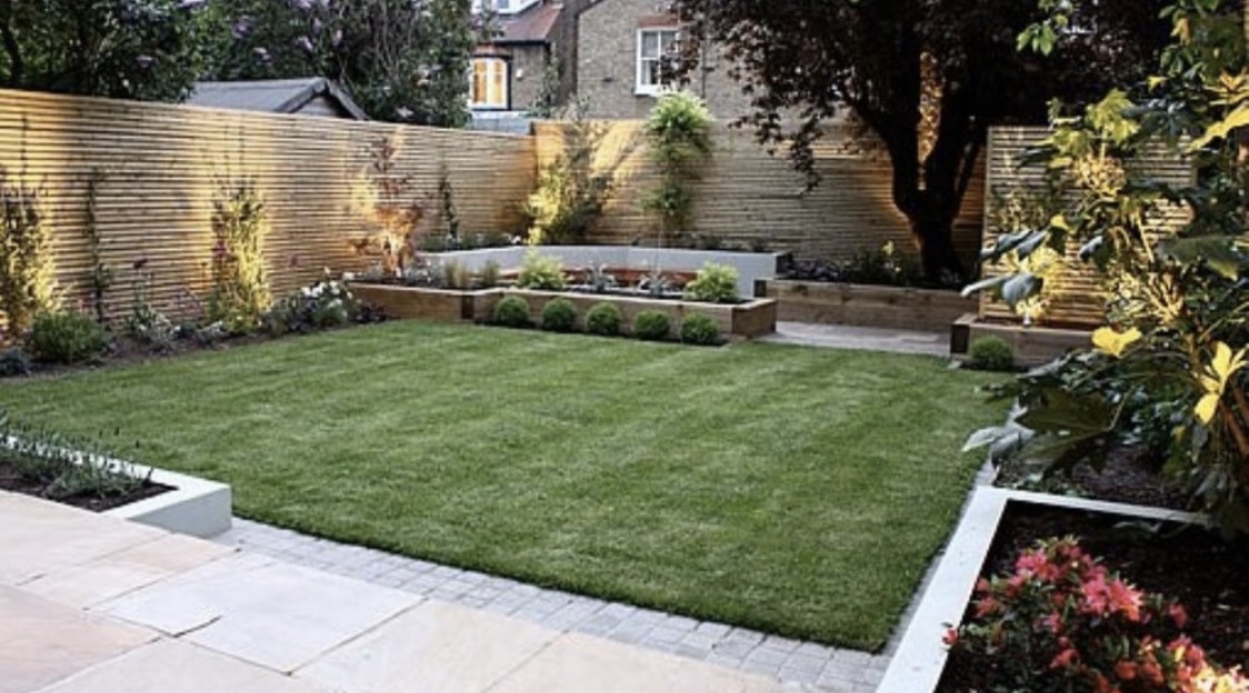 flagstone pavers, concrete, and wood planters with SOD installation